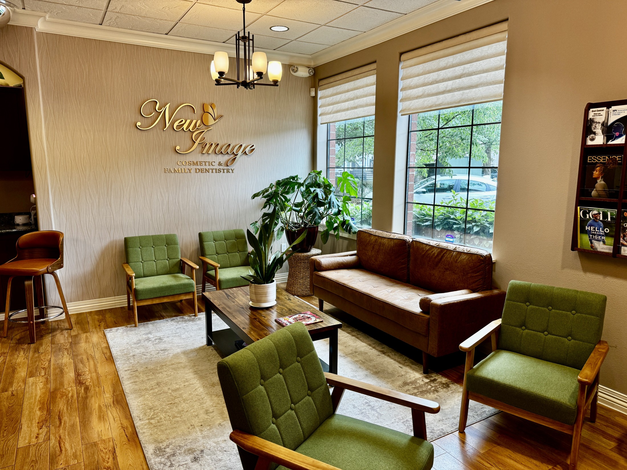 Waiting Room with a couch and green seats