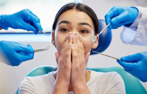 woman with anxiety at the dentist
